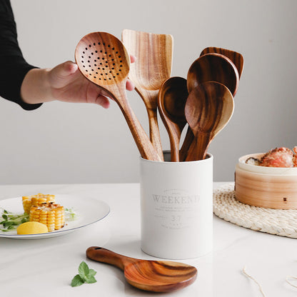 Natural teak wood kitchen set with utensils and accessories, ideal for home and dining environments, by Belro.