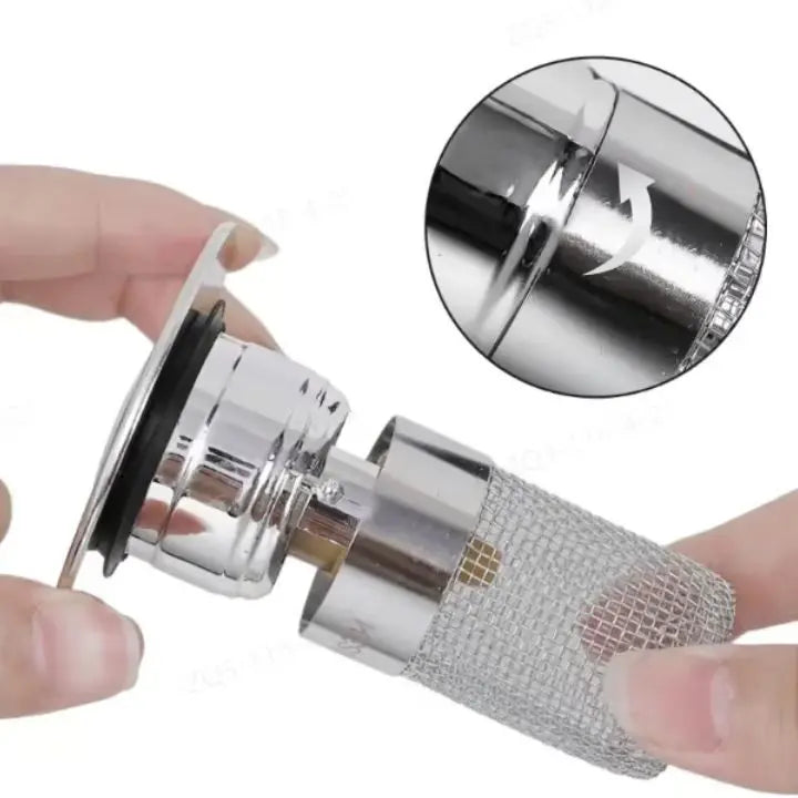 Stainless steel drain strainer with pop-up function by Mivoza, designed to prevent blockages in bathroom sink or shower drain.