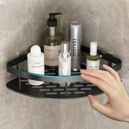 Mivoza corner shower shelf made of aluminium with self-adhesive wall mount, designed for bathroom storage and organization.