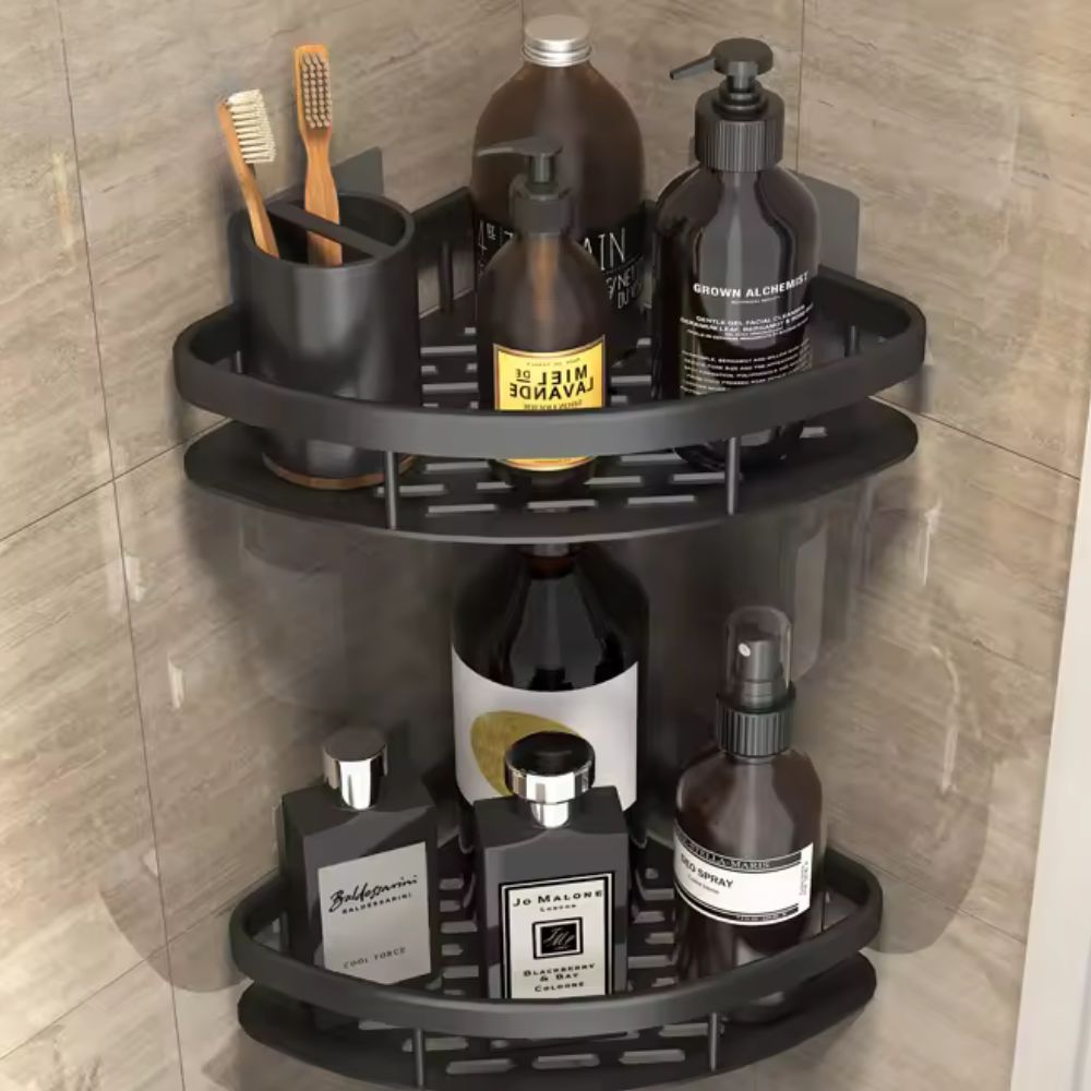 Mivoza corner shower shelf made of aluminum with a sleek curve, mounted on bathroom wall without drilling for organized storage.