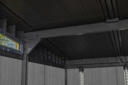 Casavibeo Keter Cortina 9x7 ft. green outdoor storage shed with heavy-duty floor and artisan Evotech design, shown in outdoor setting.