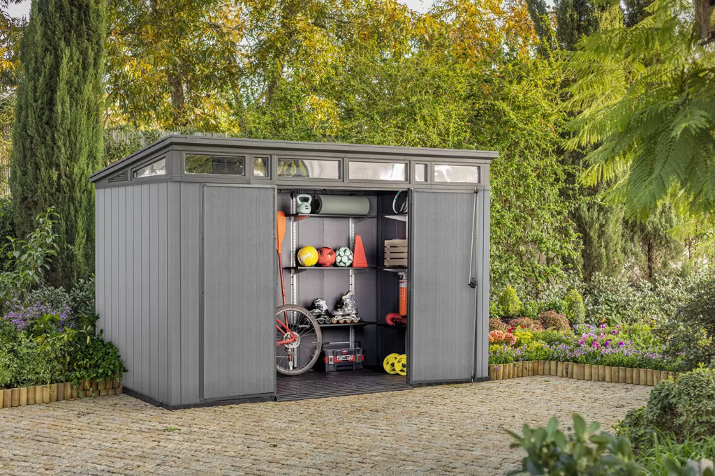 Grey Casavibeo Keter Cortina 9x7 ft outdoor storage shed with heavy-duty floor and double doors, ideal for garden storage.