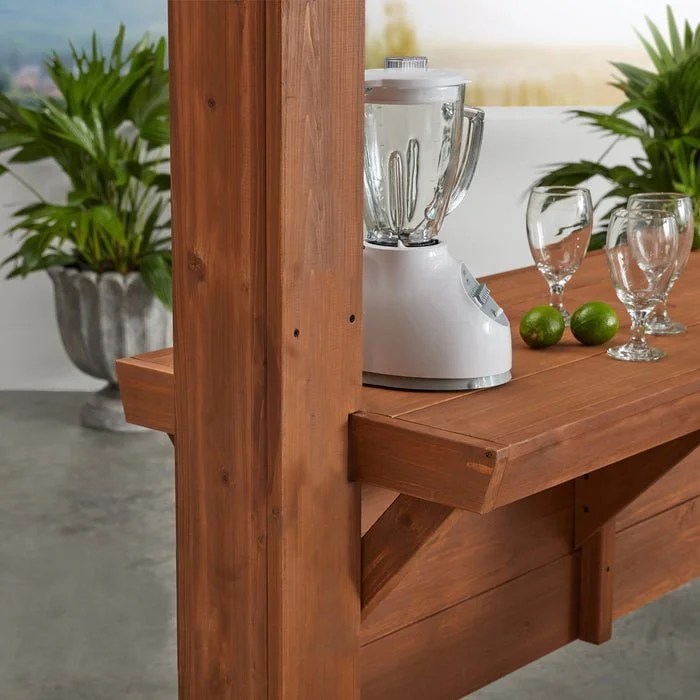 Casavibeo Ashland Backyard Discovery pergola with wooden beams and open framework for outdoor shade and relaxation.
