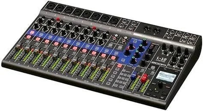Casavibeo Zoom L-12 channel mixer with powered output, showing multiple input channels and control knobs for audio mixing.