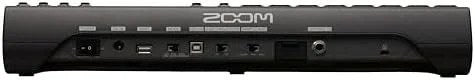 Casavibeo Zoom L-12 channel mixer with powered speakers, showing the mixer’s controls and input ports.