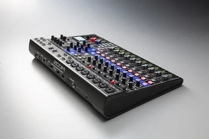 Casavibeo Zoom L-12 channel mixer with powered outputs, featuring multiple input channels and digital controls.