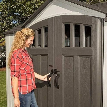 Casavibeo Lifetime 10x8 ft outdoor storage shed with double doors and windows, made of durable resin material.