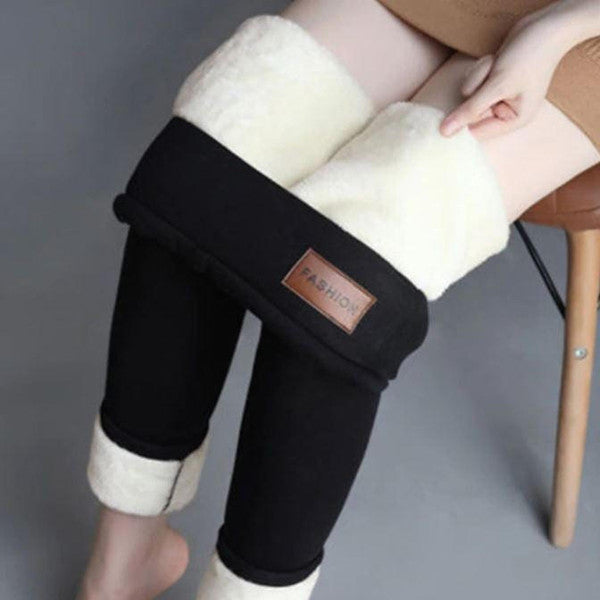 Women's fleece winter leggings by Belro, soft and warm clothing with a cozy fit, shown in a close-up image highlighting the fabric.