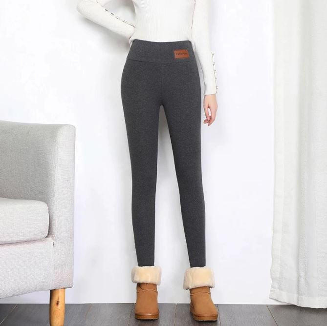 Soft navy women's fleece winter leggings by Belro, showing the comfortable stretchy fabric and snug fit for cold weather.
