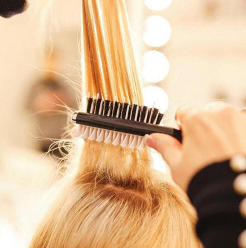 Belro bristle hair brush with wooden handle and natural bristles, ideal for gentle hair detangling and scalp massage.