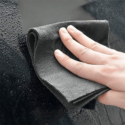 Belro Magic Cleaning Cloth draped over a T-shirt, showcasing its soft, absorbent fabric for cleaning clothing and surfaces.