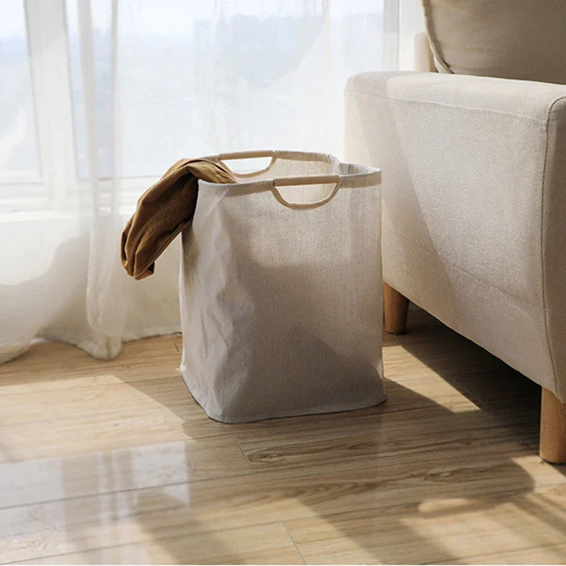 Belro Japanese-style cotton-linen laundry basket with woven texture and sturdy handles for stylish home storage.