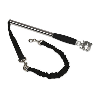 Belro dog bike harness attached to a small dog, durable pet supplies for safe cycling with your pet.