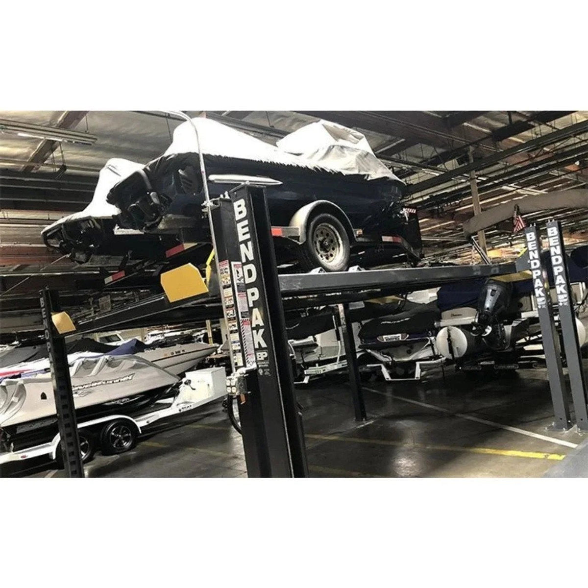 Casavibeo BendPak HD-7500BLX 7,500 lb capacity vehicle and boat storage lift with 82-inch rise, shown in a clean garage setting.