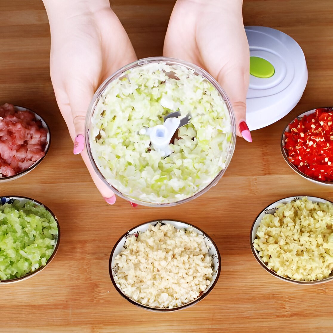 Belro manual mini chopper with stainless steel blades and compact design for easy kitchen food preparation.