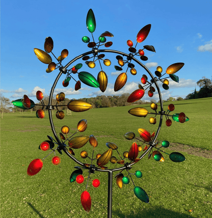 Belro magical metal windmill garden spinner with vibrant, kinetic blades spinning in the breeze for outdoor decor.