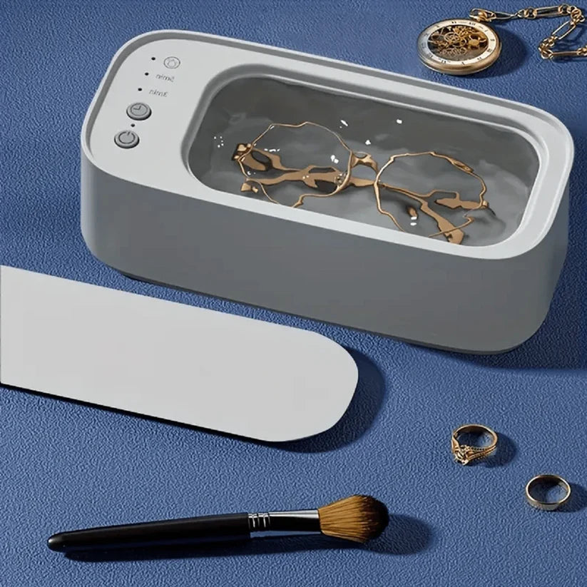 Belro ultrasonic jewelry cleaning unit accessory showing a compact, stainless steel container for cleaning jewelry items.