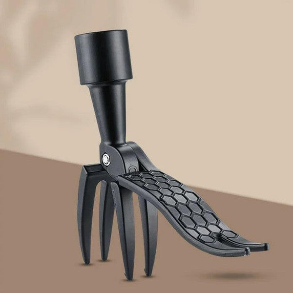 Belro mechanical weeder tool for home and garden use, featuring a metal handle and sharp blades for weed removal.