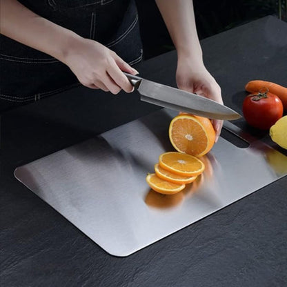 Belro titanium cutting board placed on a kitchen countertop, showcasing its sleek, durable design for home and dining use.