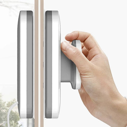 Belro automatic double-sided magnetic window cleaner with two magnetic pads and cleaning pads for streak-free window cleaning.