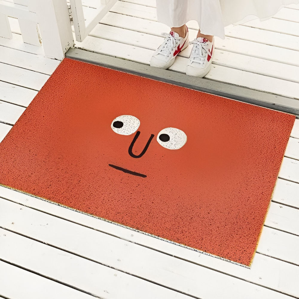 Cheeky smiley face print doormat with non-slip PVC backing, quick-drying, 40x60cm, perfect for home entryways.