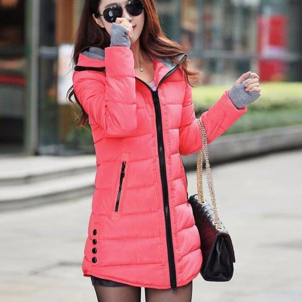 Long quilted coat for women by Belro, featuring a padded design, high collar, and side pockets in a stylish winter outerwear style.