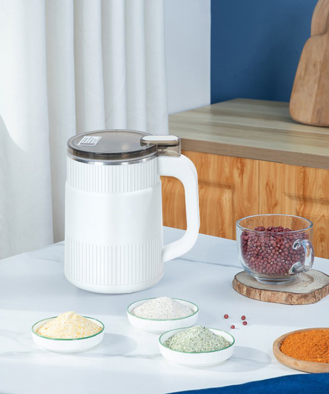 Belro flour mill for home kitchen, showing the compact metal grinding machine with a hopper and control knob.