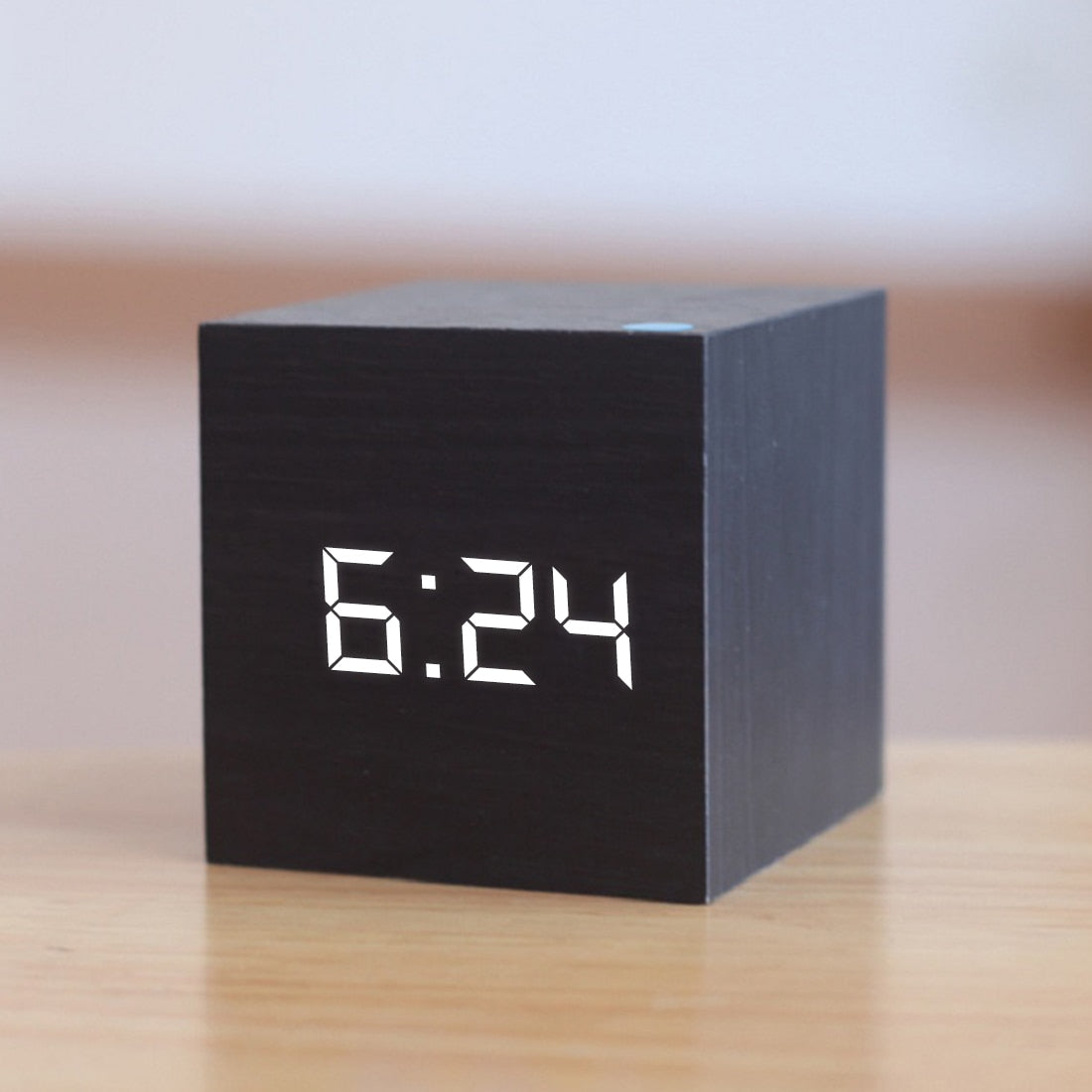 Mivoza digital LED alarm clock with temperature display, snooze function, sleek design, suitable for bedroom or bedside use.