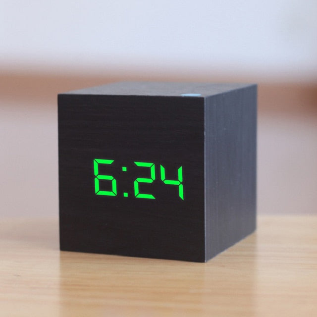 Mivoza digital LED alarm clock with temperature display, snooze function, sleek design, suitable for bedroom use.