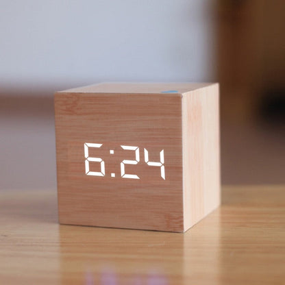 Mivoza digital LED alarm clock with temperature display and snooze function, sleek design suitable for bedroom decor.