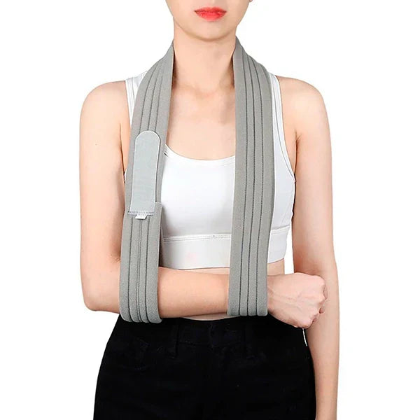 Adjustable Belro arm sling with padded straps for comfortable arm support, displayed on a plain background.