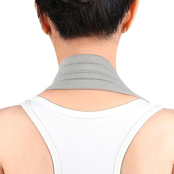 Adjustable Belro arm sling in black fabric with padded strap and metal buckle, designed to support and stabilize the arm.