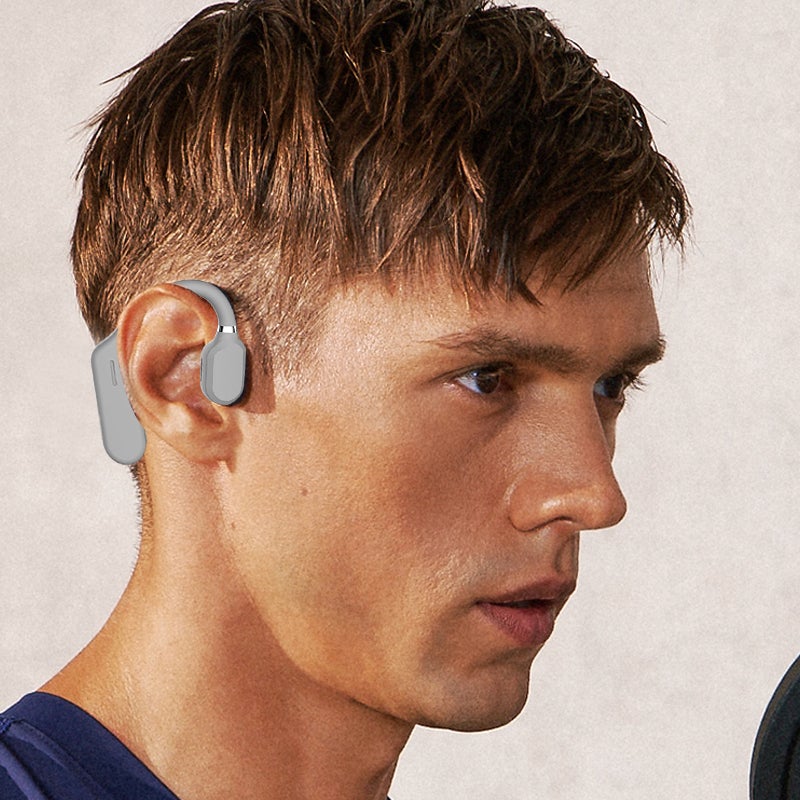 Belro self-adjusting Bluetooth headphones with cushioned ear cups and adjustable headband, designed for comfortable wireless listening.
