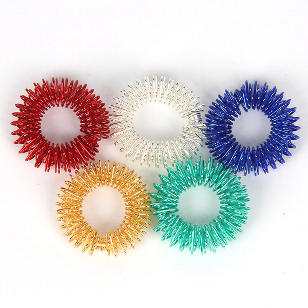 Belro acupressure finger massage rings with spiked sensory impressions for stress relief and relaxation.