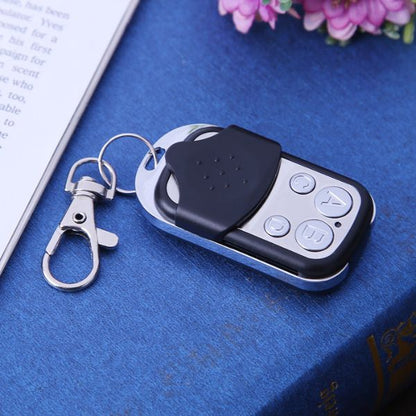 Belro universal gate remote control for outdoor home and garden use, showing buttons and compact design.