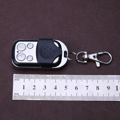 Belro Universal Gate Remote Control for outdoor home and garden use, handheld device with buttons for gate operation.