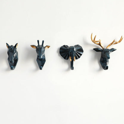 Belro animal head wall hook mounted on a wall, used as a decorative clothing and robe hook for bedrooms or bathrooms.