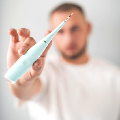 Belro Professional Dental Scaler in electronics, showing the handheld device with a sleek design and scaler tip for dental cleaning.