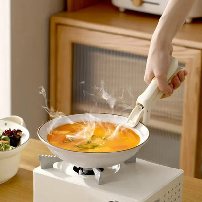 Belro heat-resistant handle for cookware, suitable for kitchen and dining, shown attached to a pot or pan in a home kitchen setting.
