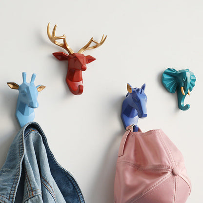 Belro animal head wall hook mounted on a robe, showcasing a decorative animal head design for clothing or bedroom decor.