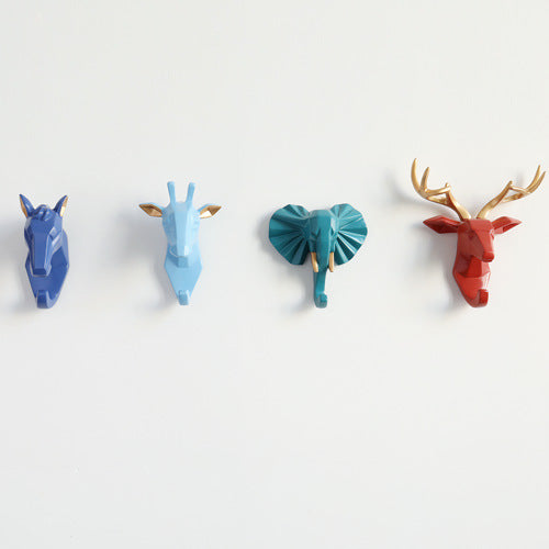 Belro animal head wall hook designed for clothing and sleepwear storage, featuring a detailed animal head sculpture.