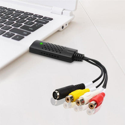 Belro VHS to digital file converter device with cables and connectors for converting VHS tapes to digital format.