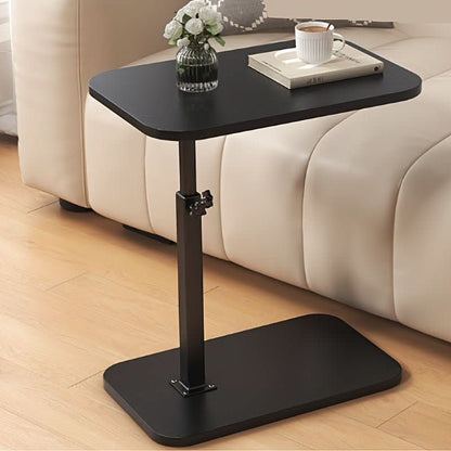 Height-adjustable Mivoza side table with wood top and metal frame, perfect for sofa or bedroom use.