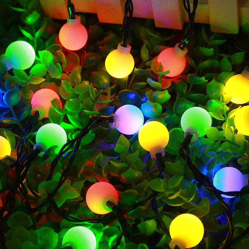 Belro solar-powered fairy lights for outdoor use, string of small LED lights ideal for garden or patio decoration.