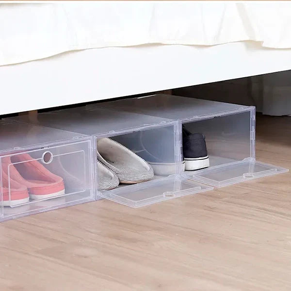 Six clear Belro plastic shoe boxes stacked for footwear organization, showcasing their stackable, transparent design.