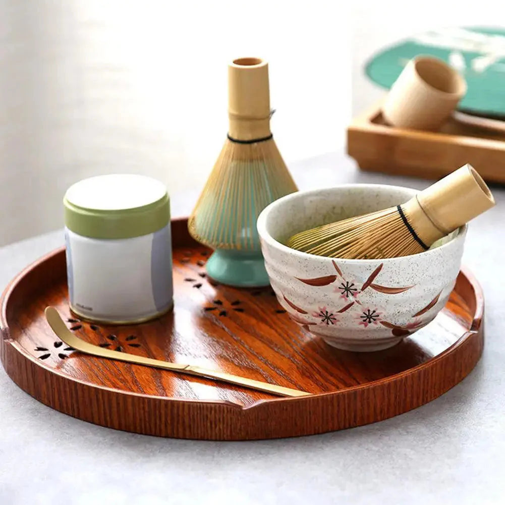 Belro traditional matcha tea set with a bamboo whisk, bowl, and scoop for Japanese tea preparation on a wooden table.