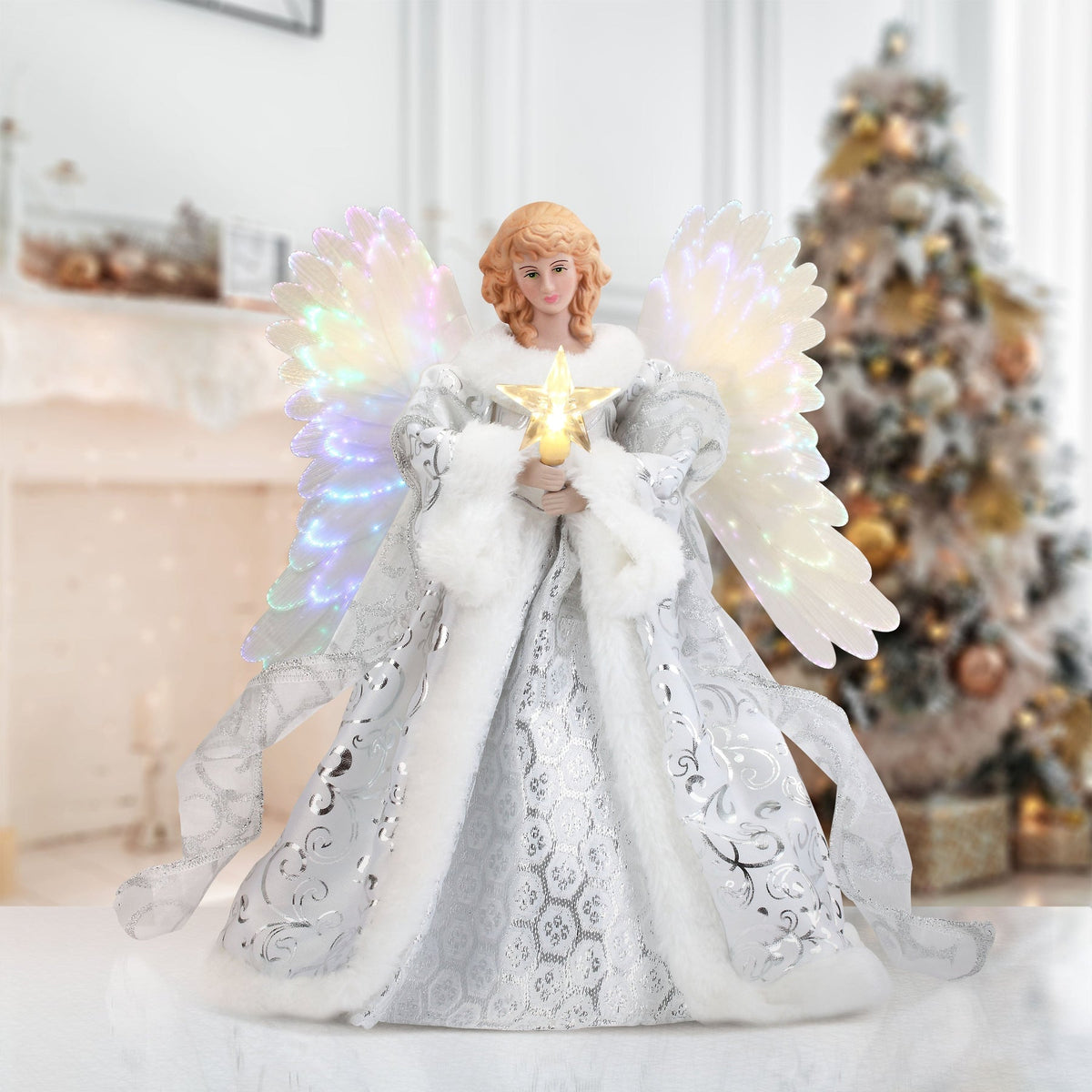 Animated angel tree topper by Belro, featuring a detailed angel figure with flowing gown and wings, perfect for holiday decorating.