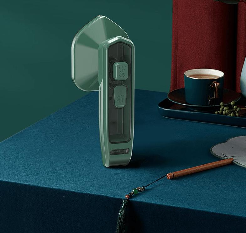Belro mini portable iron for home and outdoor use, compact appliance with a sleek design and easy-to-handle handle.