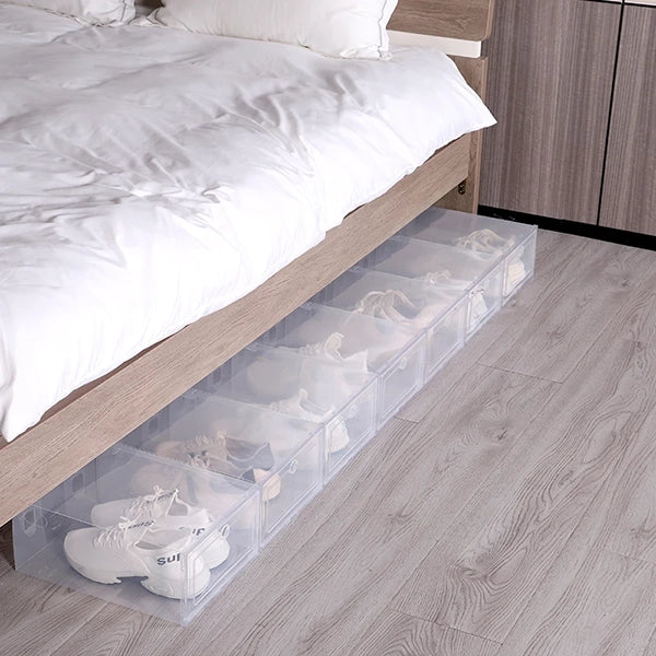 Stacked clear plastic shoe boxes by Belro, six-pack, designed for footwear organization and easy visibility.