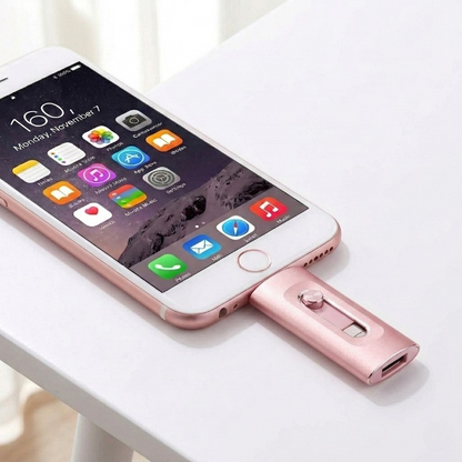 Mivoza 3-in-1 USB flash drive compatible with iPhone, Android, and PC, showing multiple connectors and storage ports in a close-up image.